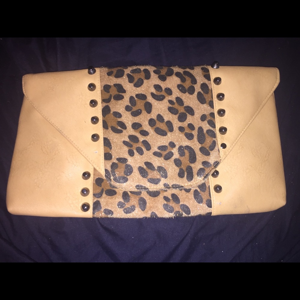 Tan and cheetah print oversized clutch